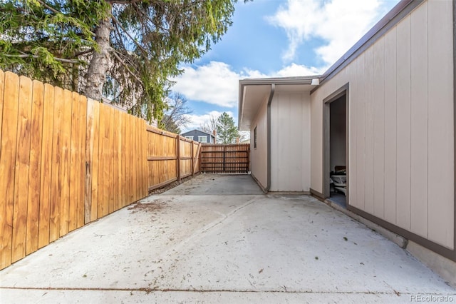 exterior space featuring a patio area and fence