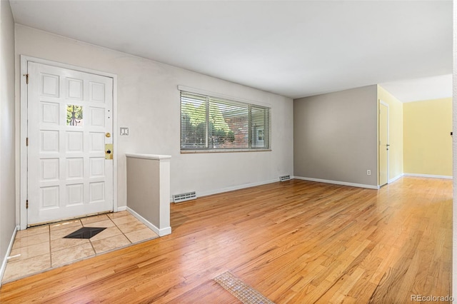 entrance foyer with light wood-type flooring