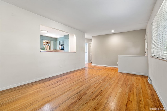 empty room with light wood-type flooring