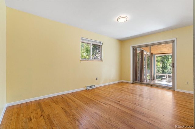 empty room with light wood-type flooring