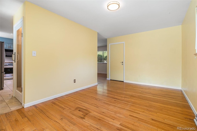 empty room featuring light wood-type flooring