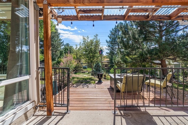 wooden terrace featuring a pergola