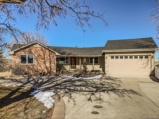 ranch-style home featuring a garage