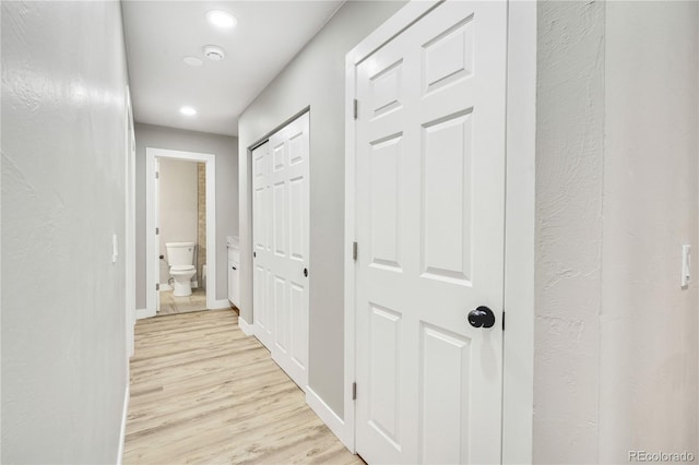 corridor featuring light wood-type flooring