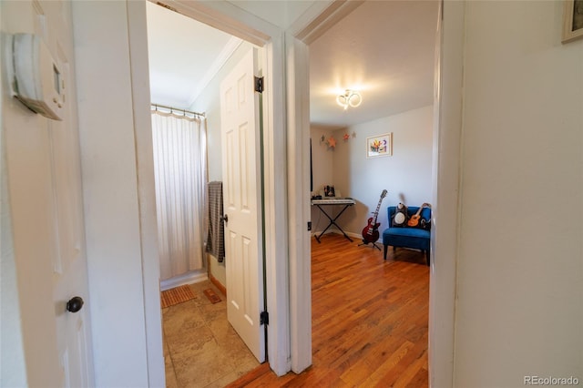 hallway with light wood-style flooring