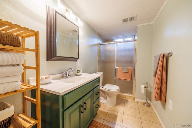 bathroom with visible vents, a stall shower, tile patterned flooring, and toilet