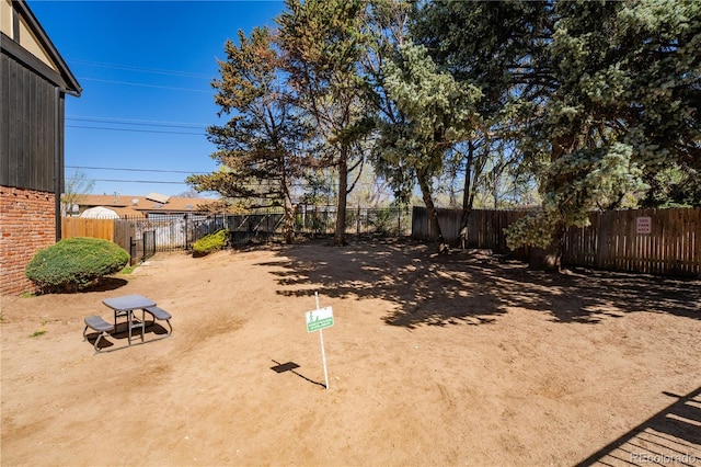 view of yard featuring a fenced backyard