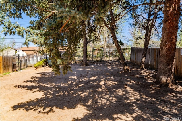view of yard featuring fence