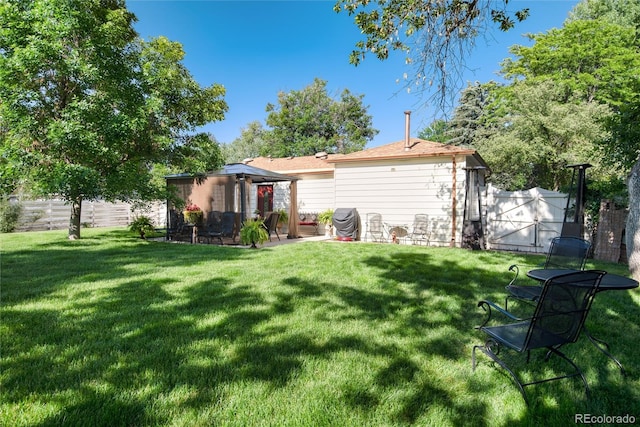 5215 S Washington St, Littleton, CO 80121 - back of house with a gazebo and a patio area
