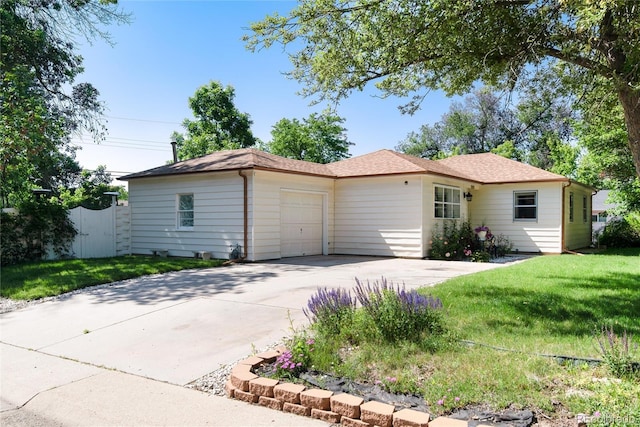 5215 S Washington St, Littleton, CO 80121 - single story home featuring an attached garage and driveway