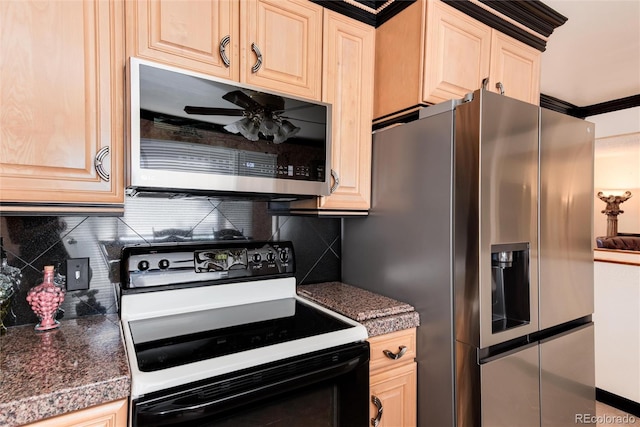 5215 S Washington St, Littleton, CO 80121 - kitchen featuring appliances with stainless steel finishes, light brown cabinetry, decorative backsplash, and tile countertops