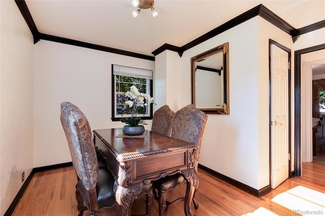 5215 S Washington St, Littleton, CO 80121 - dining area with ornamental molding and light wood-type flooring