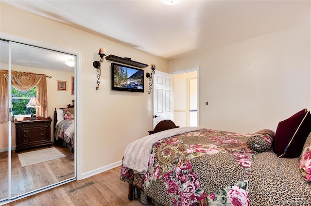 5215 S Washington St, Littleton, CO 80121 - bedroom with wood finished floors and baseboards