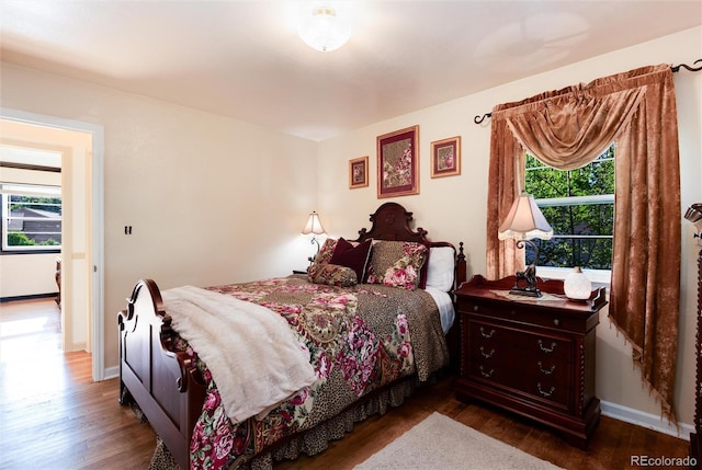 5215 S Washington St, Littleton, CO 80121 - bedroom featuring wood finished floors and baseboards