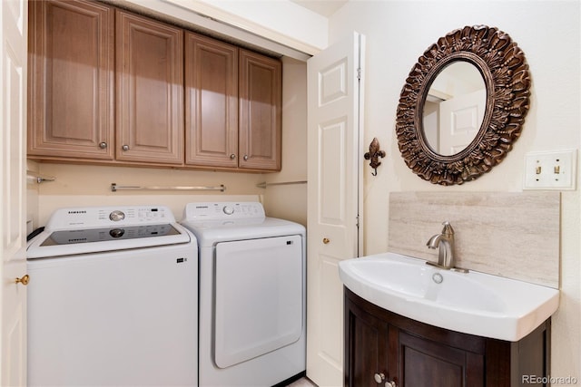 5215 S Washington St, Littleton, CO 80121 - washroom featuring washing machine and dryer and cabinet space