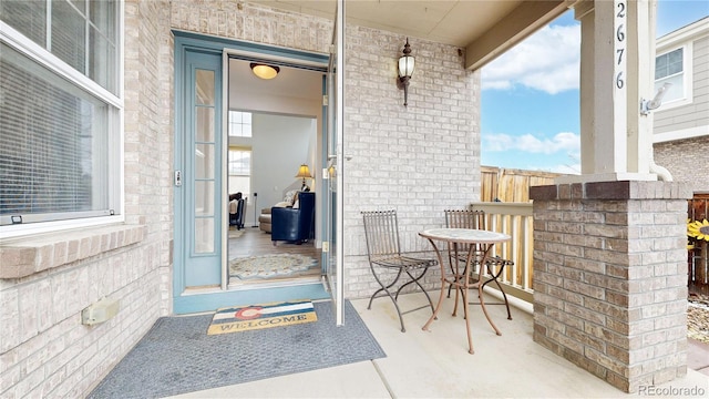 doorway to property featuring a porch