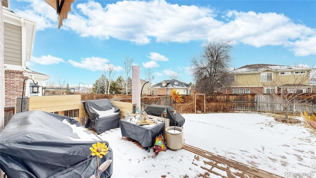 view of yard covered in snow