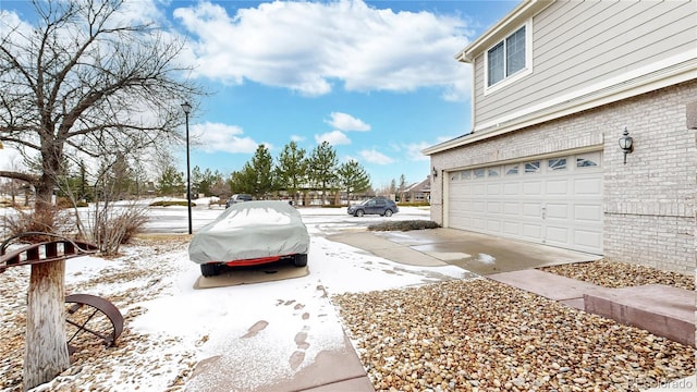 exterior space with a garage