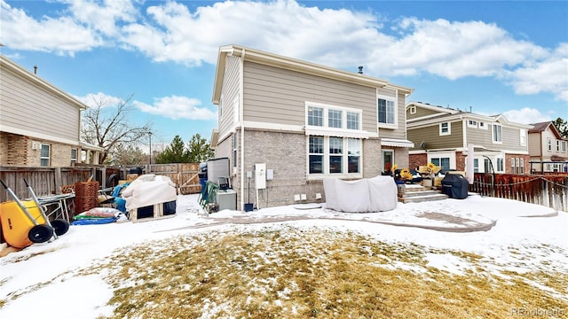 view of snow covered property