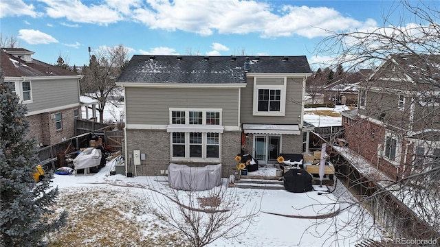 view of snow covered property