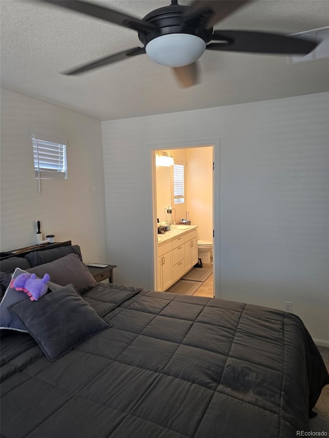 18006 E 103rd Ave, Commerce City, CO 80022 - bedroom featuring ensuite bath and ceiling fan