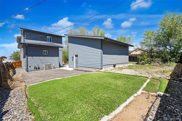 5470 Krameria St, Commerce City, CO 80022 - rear view of house featuring a patio