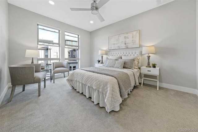 carpeted bedroom with ceiling fan