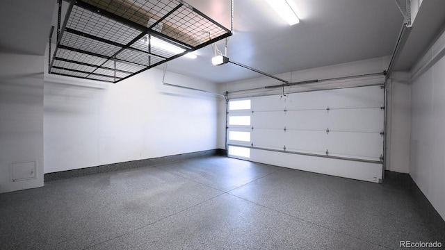 garage featuring a garage door opener