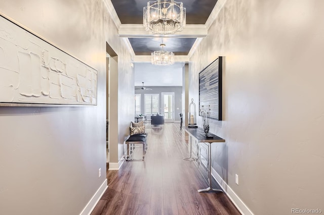 268 Simmental Loop, Castle Rock, CO 80104 - corridor with a chandelier, wood finished floors, and crown molding