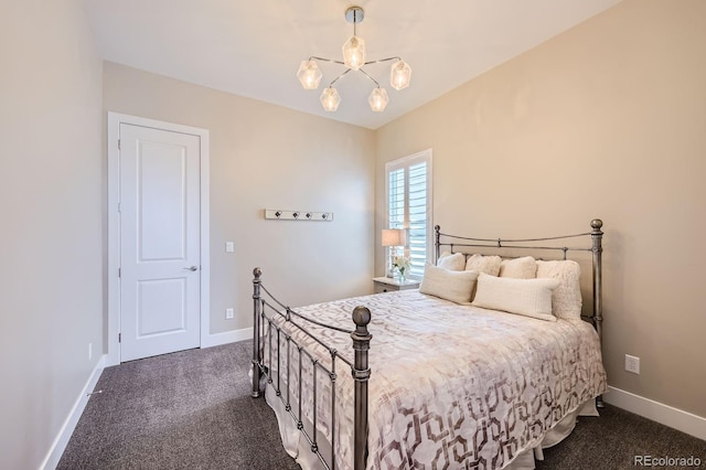 268 Simmental Loop, Castle Rock, CO 80104 - bedroom featuring dark colored carpet and a chandelier