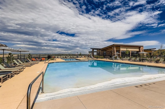 268 Simmental Loop, Castle Rock, CO 80104 - community pool with a patio area and a jacuzzi