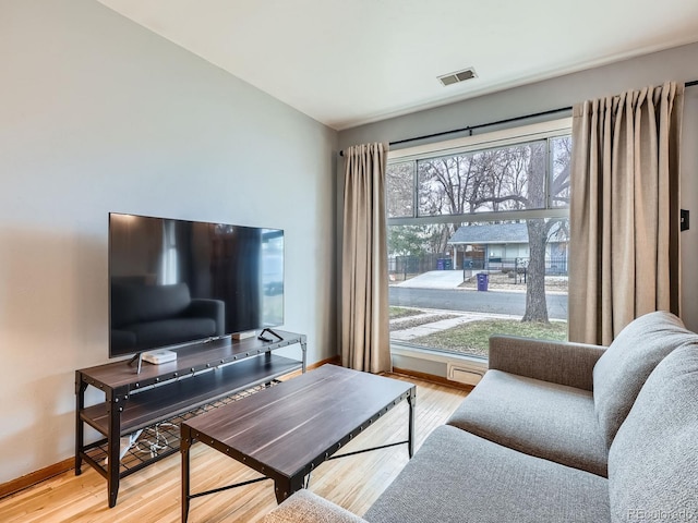 living room with light hardwood / wood-style floors