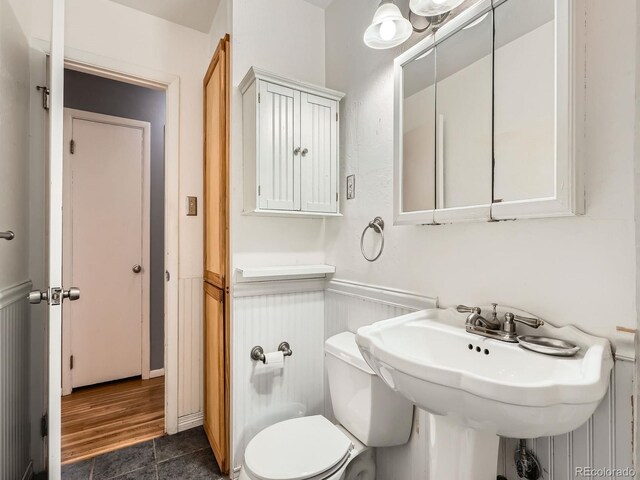 bathroom with toilet and sink