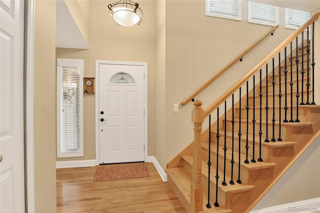 6338 S Oneida Ct, Centennial, CO 80111 - foyer with wood finished floors and stairway