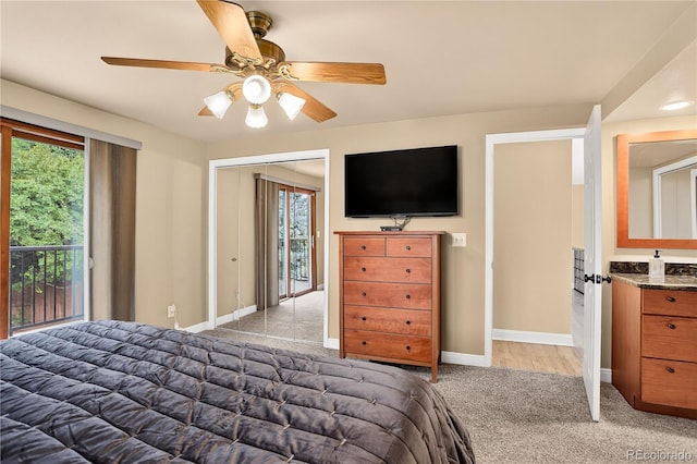 6338 S Oneida Ct, Centennial, CO 80111 - bedroom featuring multiple windows, carpet floors, access to outside, and ceiling fan