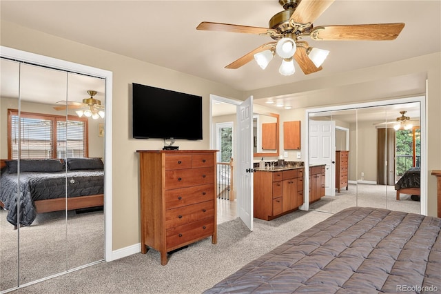 6338 S Oneida Ct, Centennial, CO 80111 - bedroom featuring light carpet, multiple windows, and ceiling fan