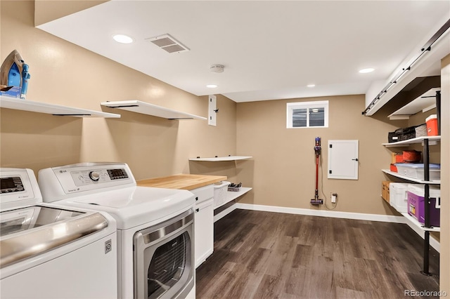 6338 S Oneida Ct, Centennial, CO 80111 - laundry room featuring separate washer and dryer, dark wood-type flooring, and recessed lighting