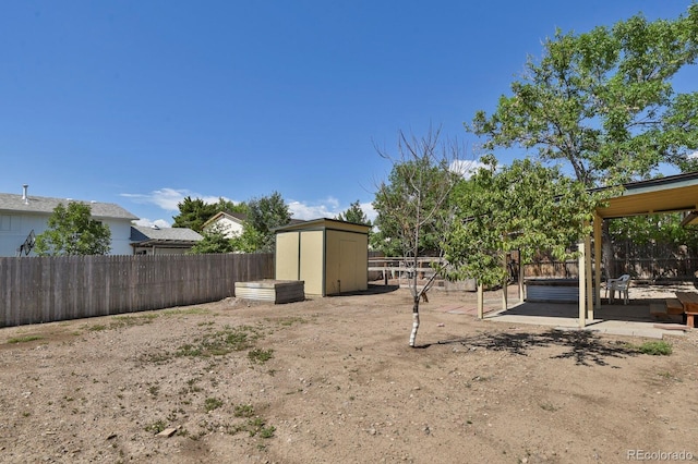 8381 Vine St, Denver, CO 80229 - fenced backyard with a shed and a patio
