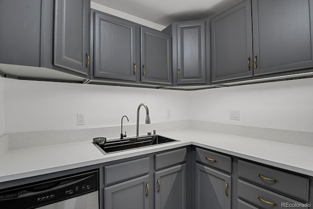 8381 Vine St, Denver, CO 80229 - kitchen featuring dishwasher, gray cabinets, and light countertops