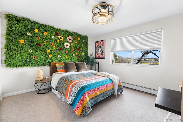 495 S Dayton St Unit 1C, Denver, CO 80247 - carpeted bedroom with a baseboard radiator and baseboards