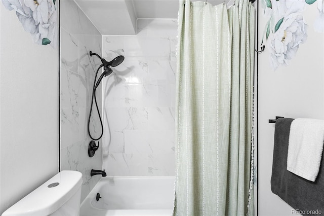495 S Dayton St Unit 1C, Denver, CO 80247 - bathroom featuring toilet and shower / bathtub combination with curtain