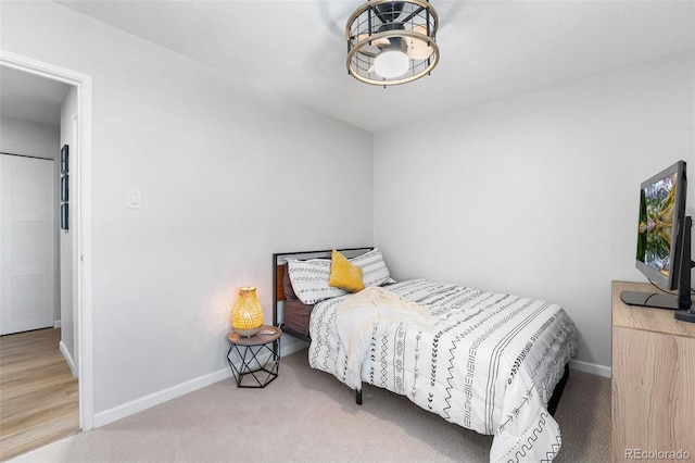 495 S Dayton St Unit 1C, Denver, CO 80247 - bedroom featuring baseboards and carpet