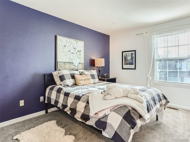 8862 Chestnut Hill Ln, Highlands Ranch, CO 80130 - carpeted bedroom with baseboards and a textured wall