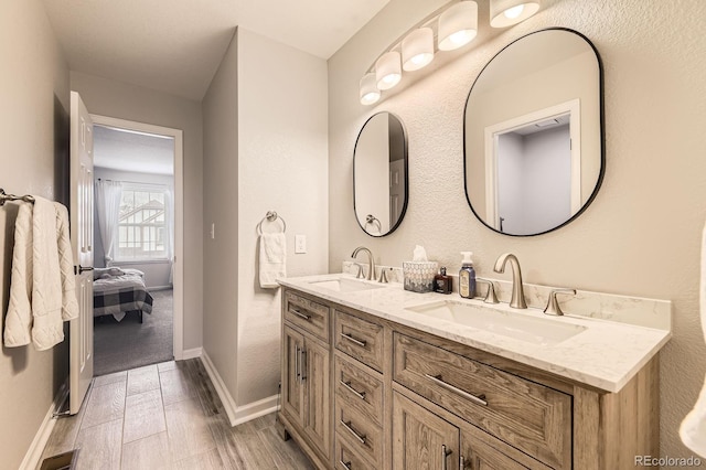 8862 Chestnut Hill Ln, Highlands Ranch, CO 80130 - full bath featuring double vanity and baseboards