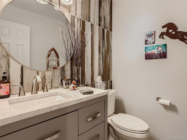 8862 Chestnut Hill Ln, Highlands Ranch, CO 80130 - half bathroom with toilet and vanity