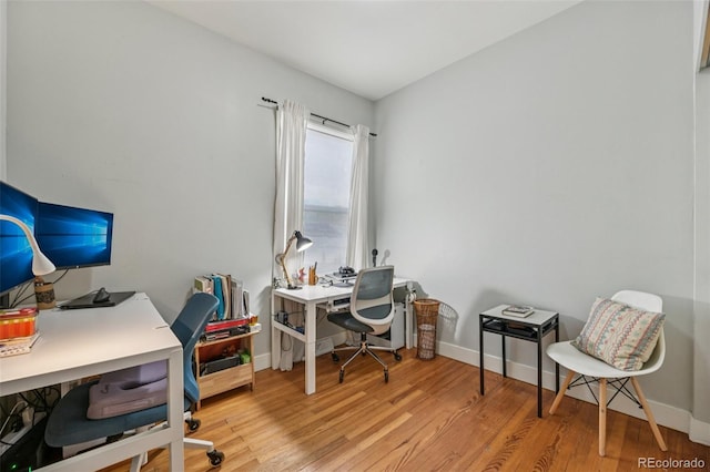3444 Lawrence St, Denver, CO 80205 - office featuring wood finished floors and baseboards