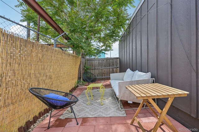 3444 Lawrence St, Denver, CO 80205 - fenced backyard with a patio area