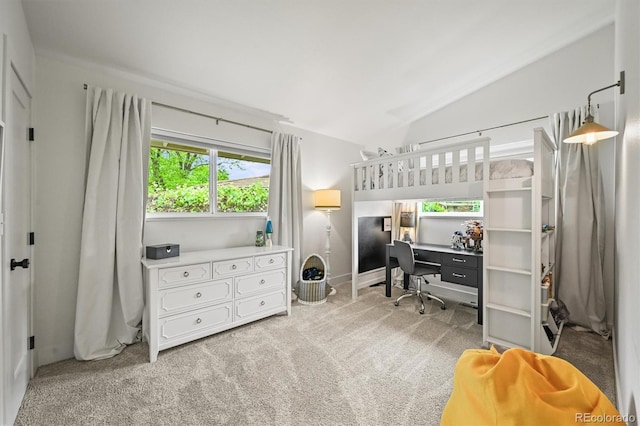 5200 W Rowland Ave, Littleton, CO 80128 - bedroom with light carpet, lofted ceiling, a desk, and baseboards