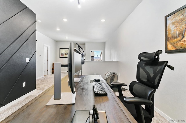 office space with recessed lighting, baseboards, and wood finished floors