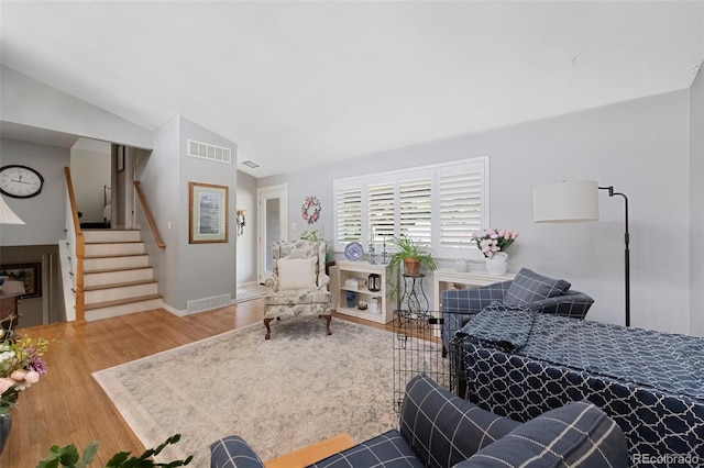 6040 Taft Ct, Arvada, CO 80004 - living area with wood finished floors, stairway, and lofted ceiling
